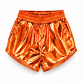 Short metalizado naranja para niña